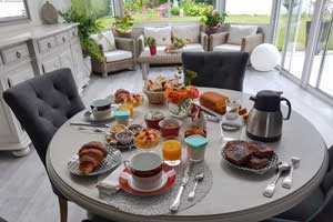 Petit déjeuner dans la véranda